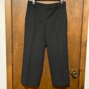 LOFT black straight legged, sewn cuffed capris. Back pockets with cute flaps.